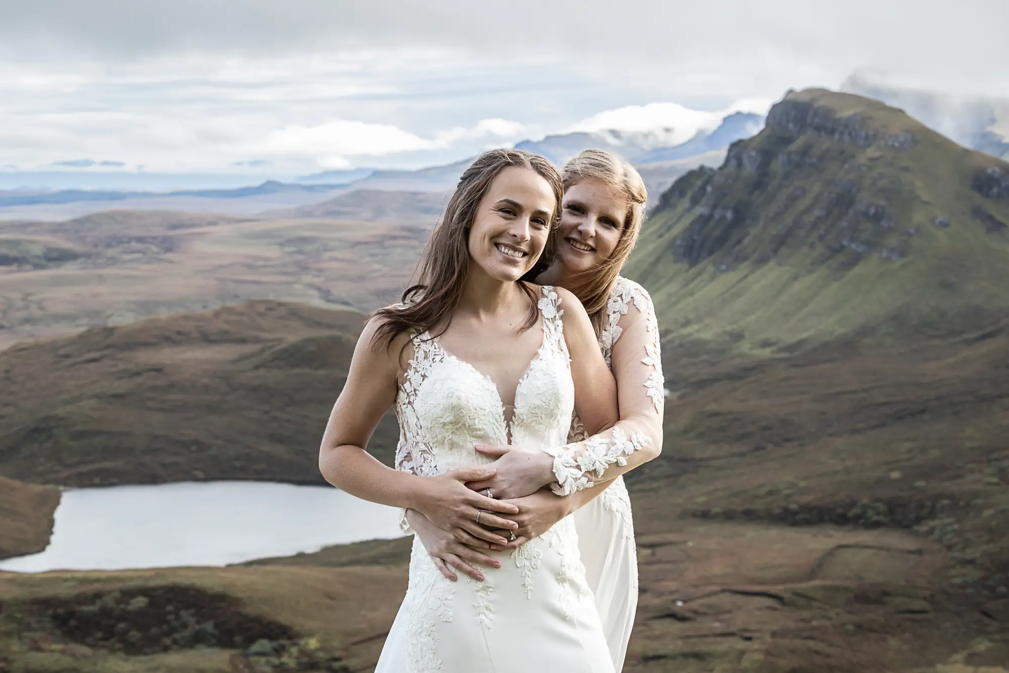 newlywed girls smiling at the camera