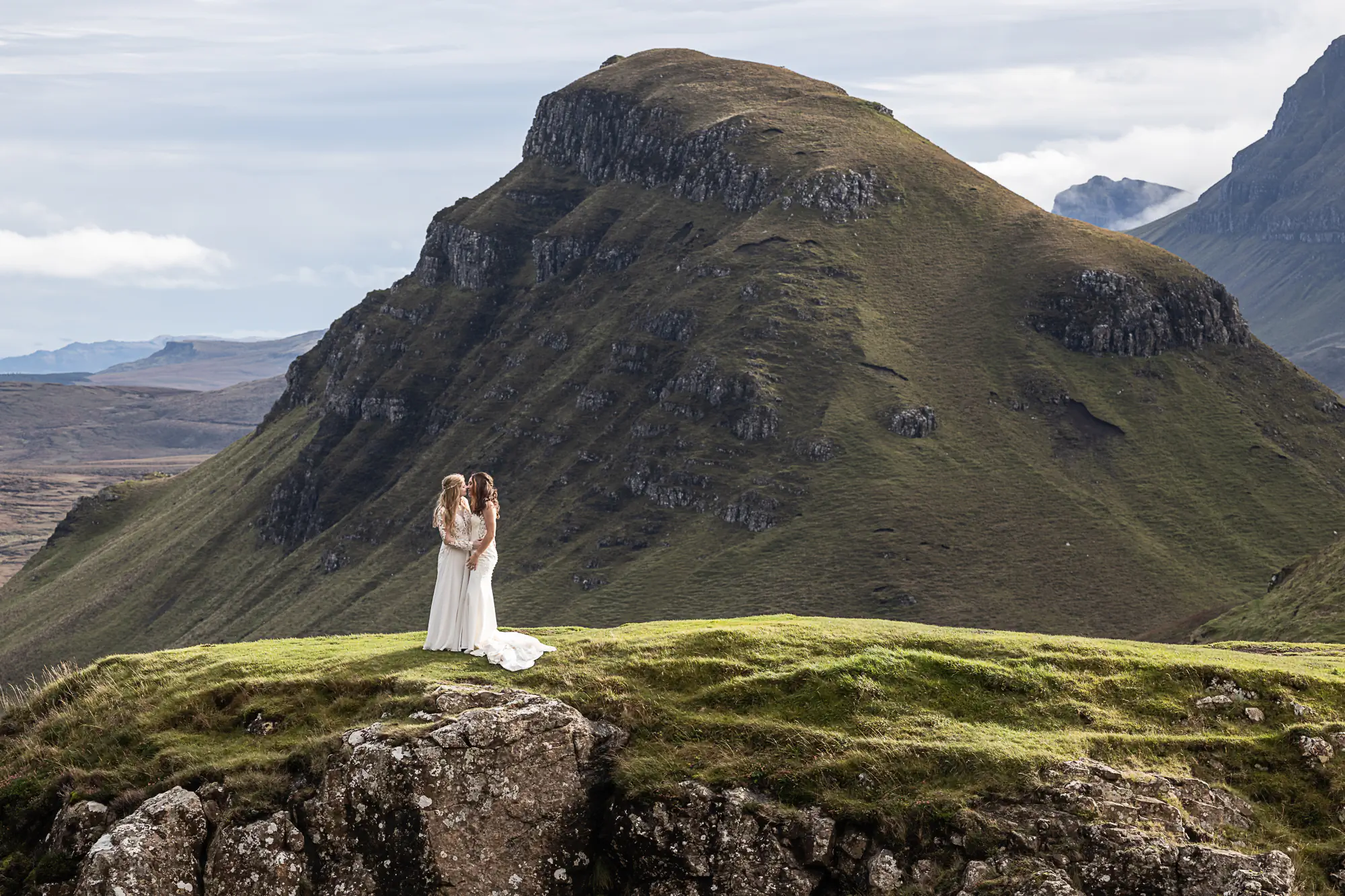 newlywed girls with a dramatic view