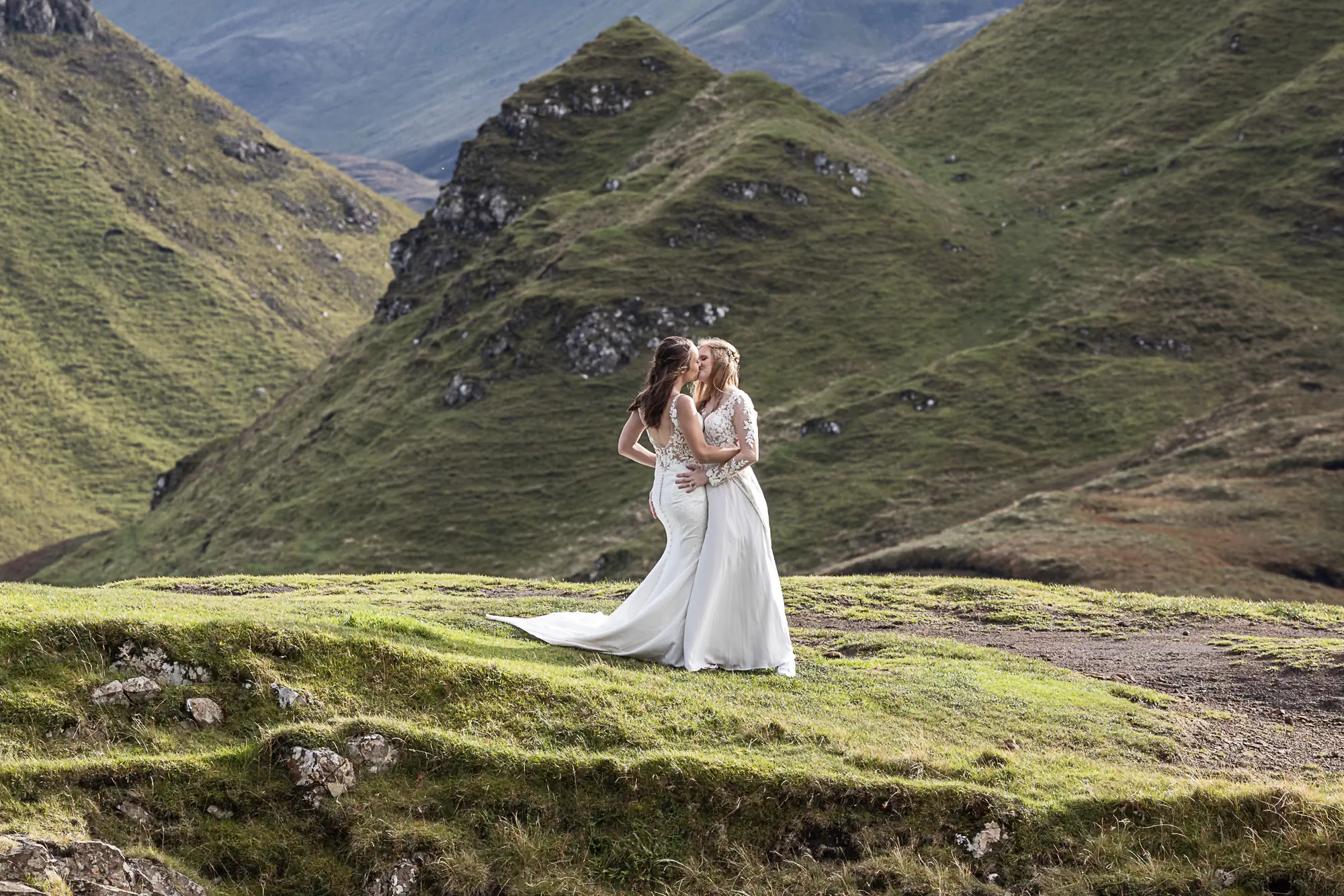 same-sex newlyweds kissing