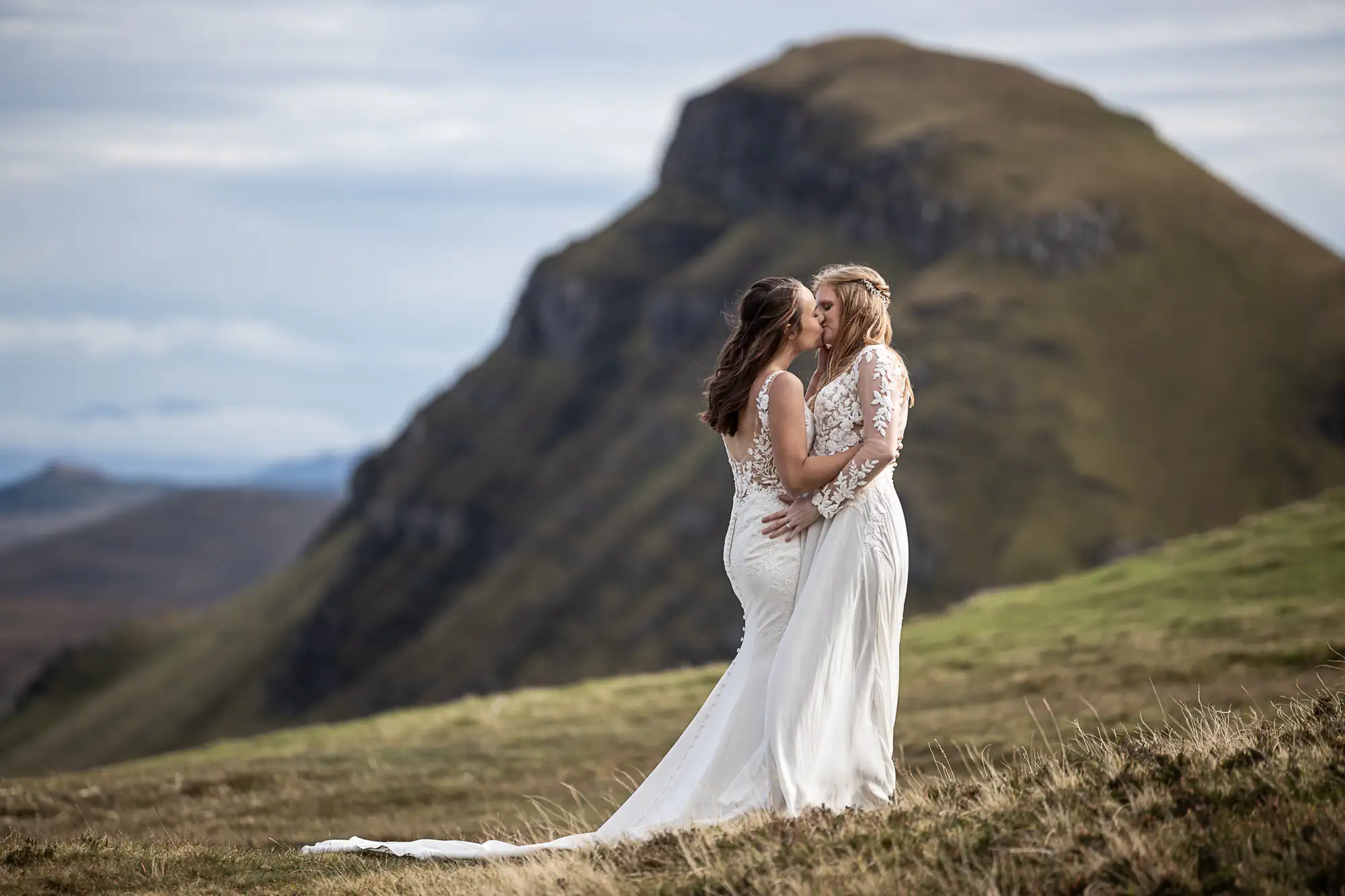 Adrienne and Emily kissing