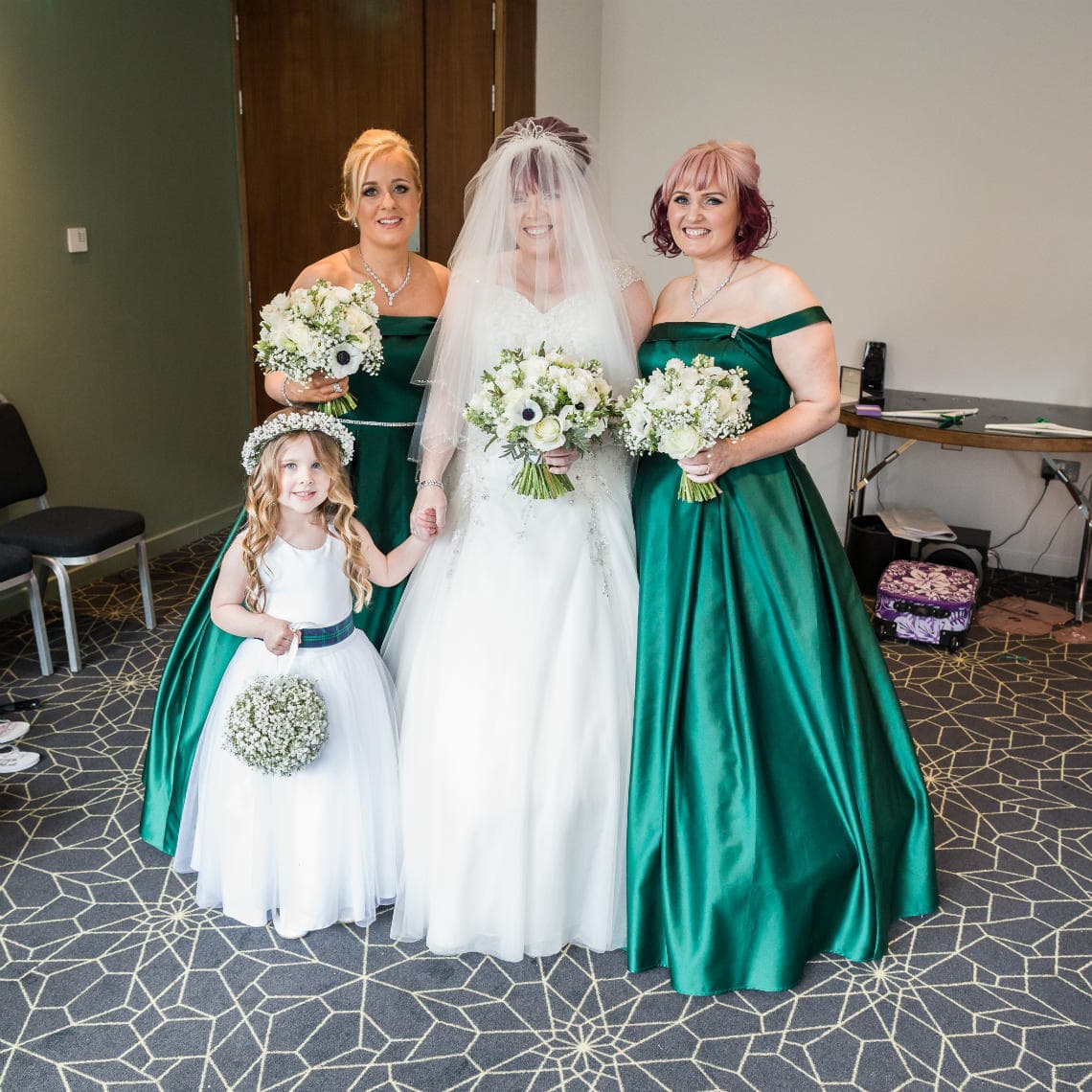bride, bridesmaids and flower girl ready for the ceremony