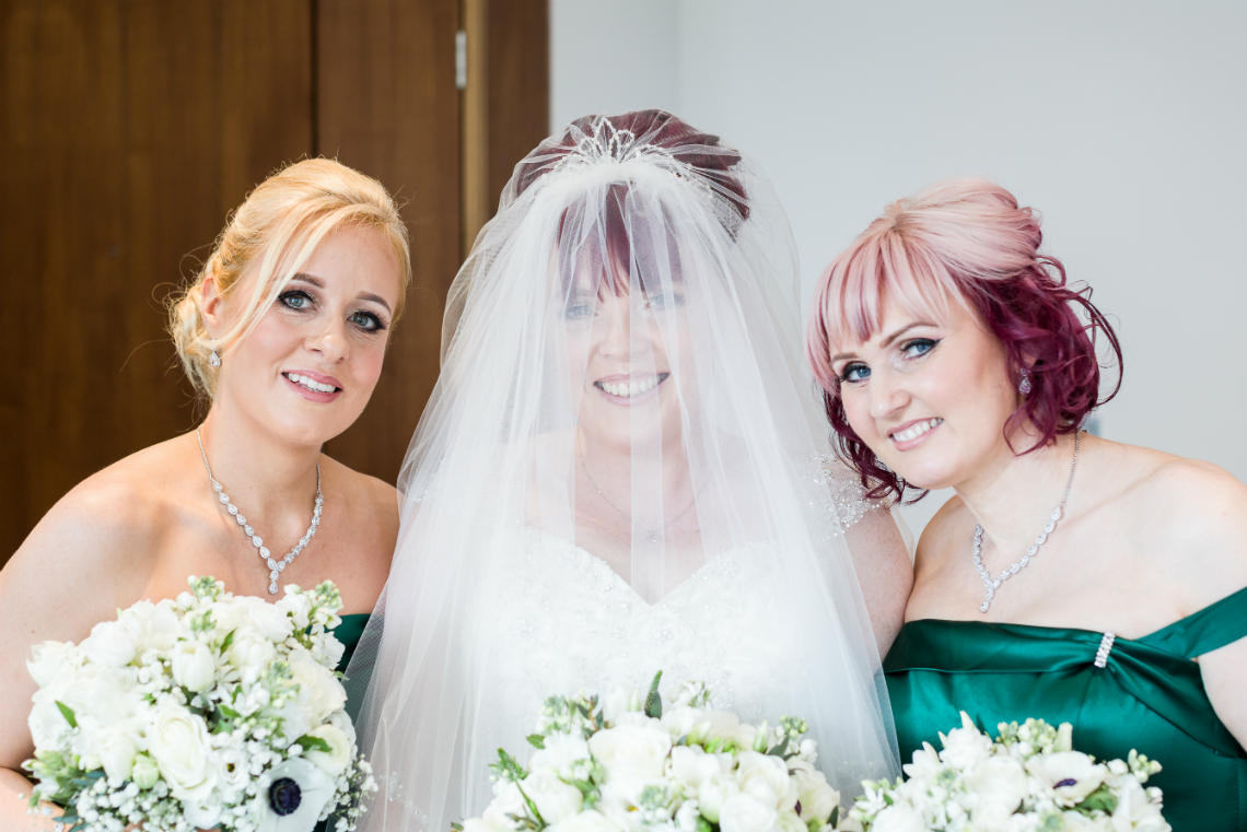 bride and bridesmaids are ready to make their way to the Heights Restaurant for the ceremony