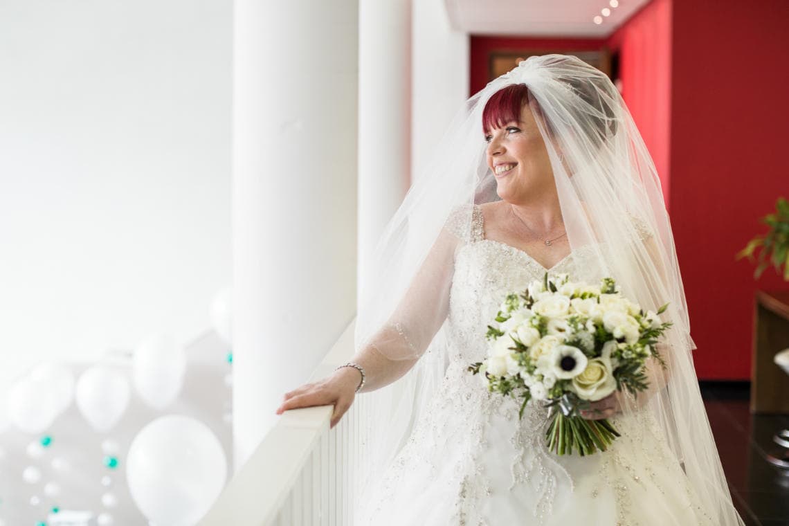 smiling bride makes her way to the ceremony