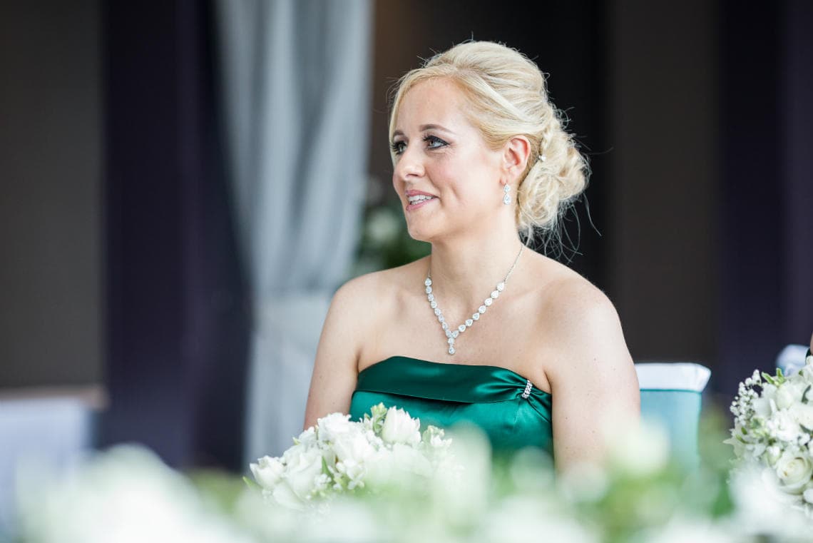 bride watches the ceremony