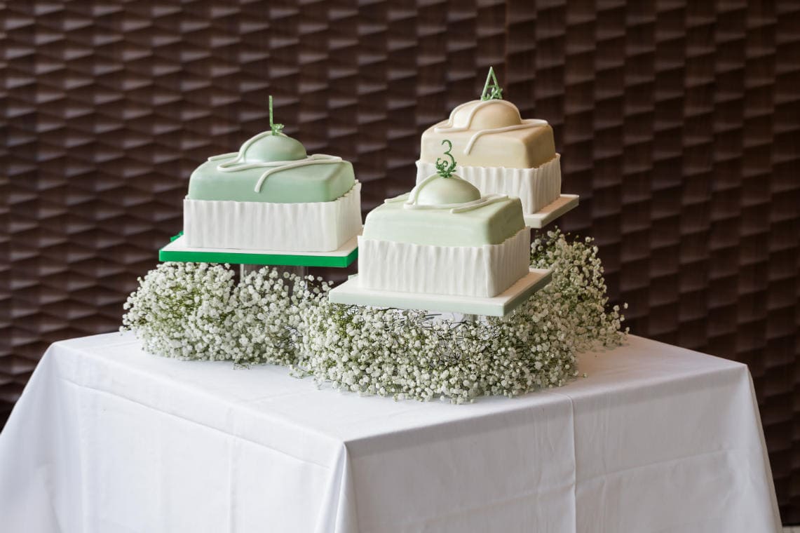 green and white French fondant fancies wedding cakes