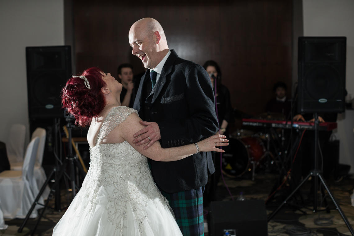 newlyweds first dance at wedding reception