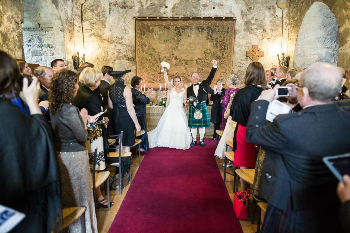 Auld Keep Great Hall ceremony newlyweds fist pump