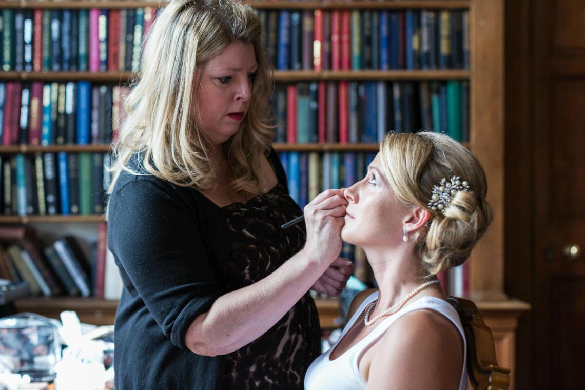 bridal makeup pre-ceremony in The Library
