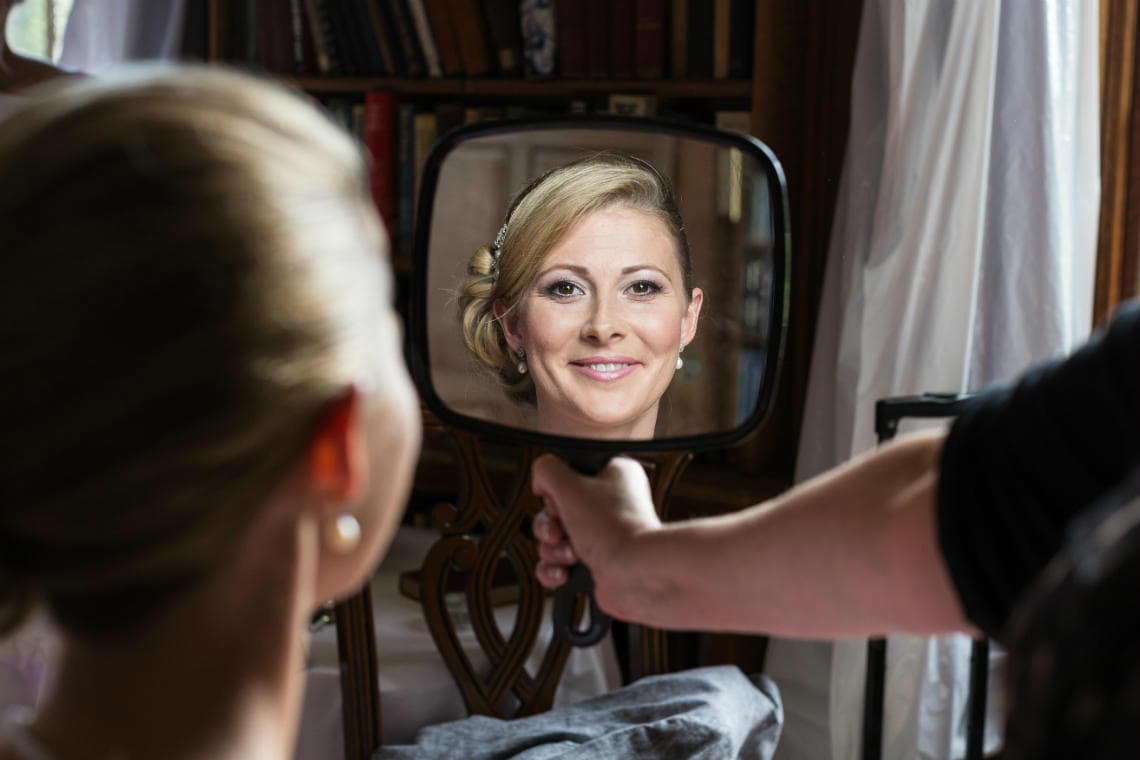 bride reflection in a mirror in The Library