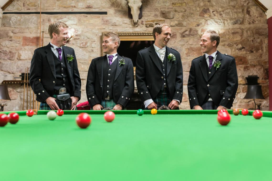 groom and groomsmen in the Snooker Room