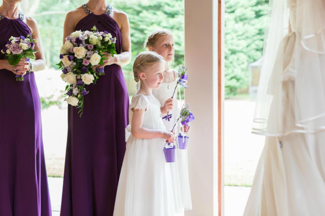 flower girls watching the humanist ceremony in The Chapel