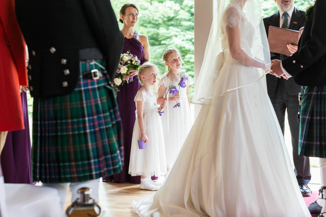 flower girls watching the Humanist ceremony in The Chapel