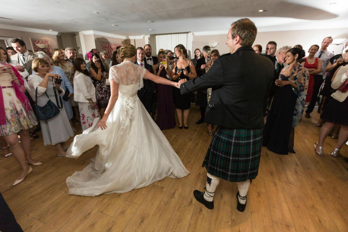 newlyweds' first dance in the Rose Garden Room