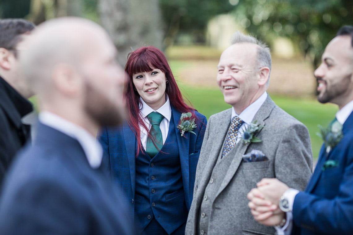 pre-ceremony laughing with the groom