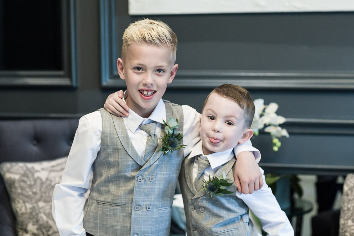 boys wearing waistcoats and ties