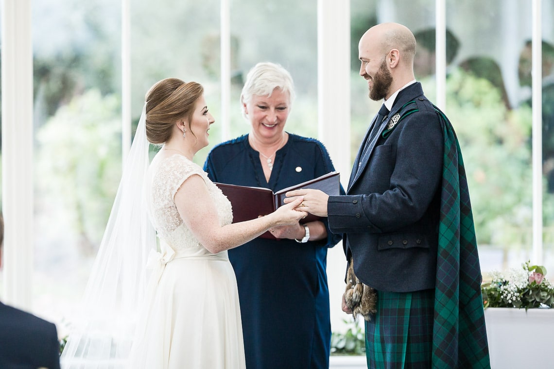 bride and groom exchanging vows