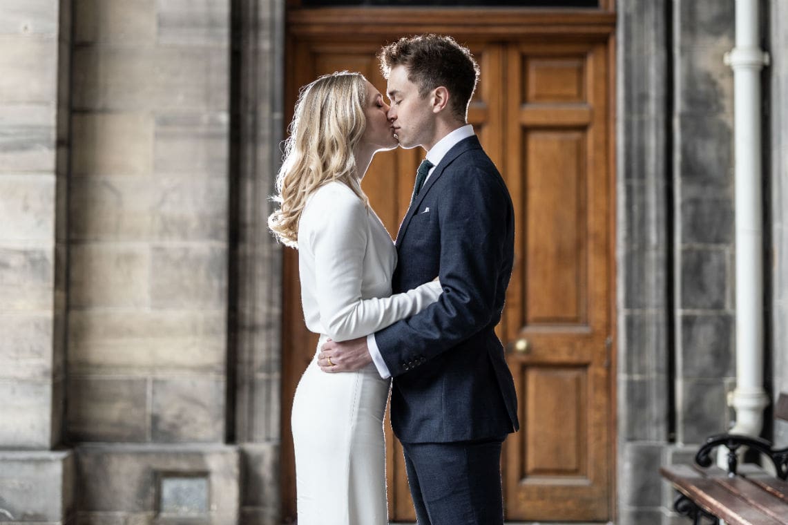 bride and groom kissing