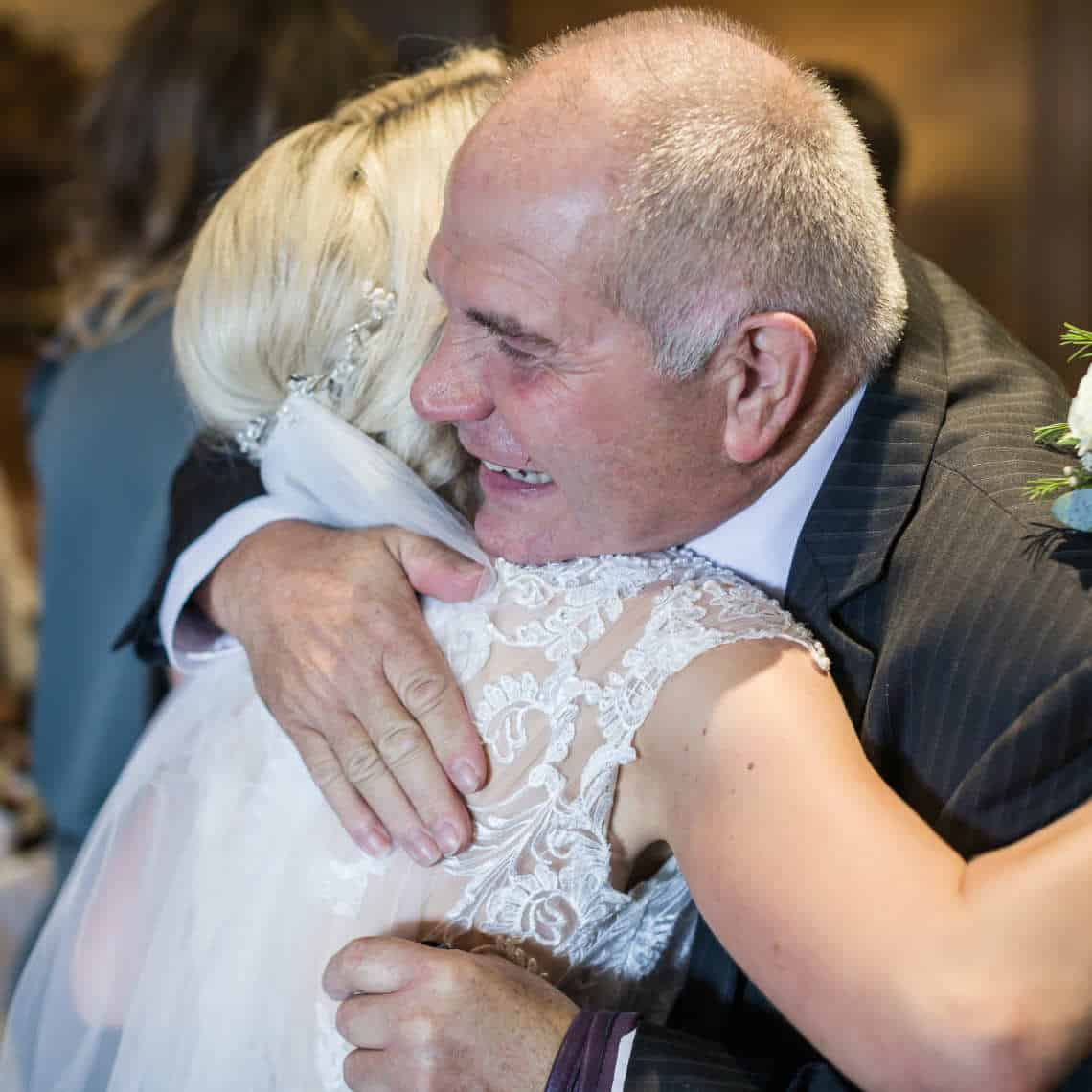 Guest congratulated bride at drinks reception at the Dalmahoy Hotel