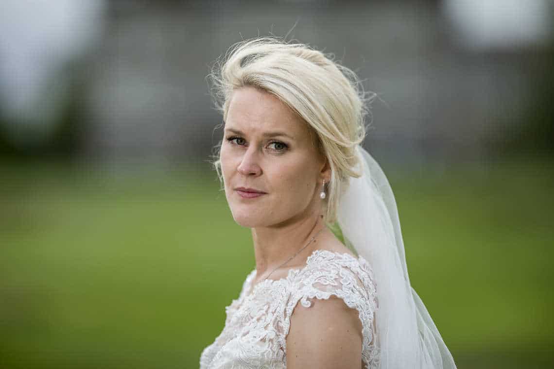 Bridal portait with blurred Dalmahoy Hotel in the background