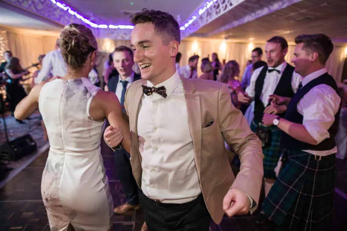 Guests dancing at evening reception