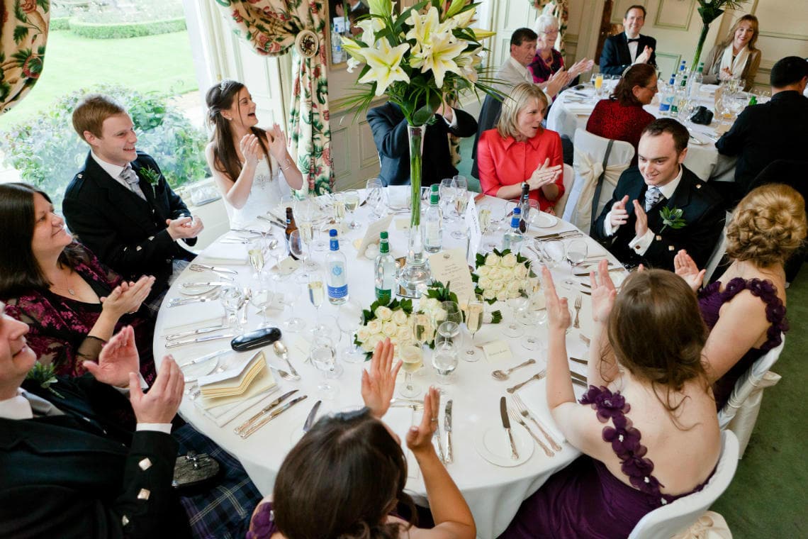Croquet Room top table laughing during a speech