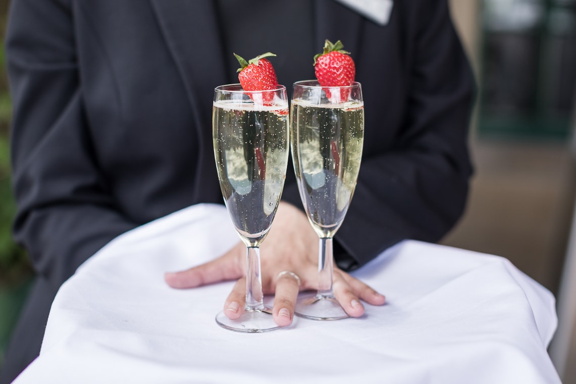 Dalmahoy staff with champagne for the newlyweds