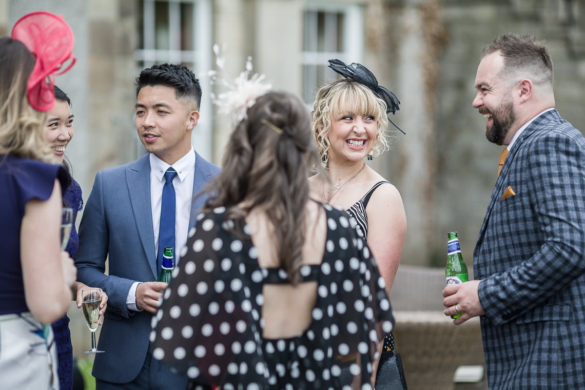 female guest smiling during the drinks reception