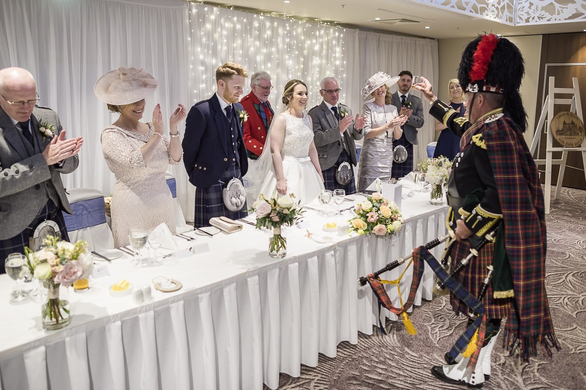 Piper toasts the newlyweds