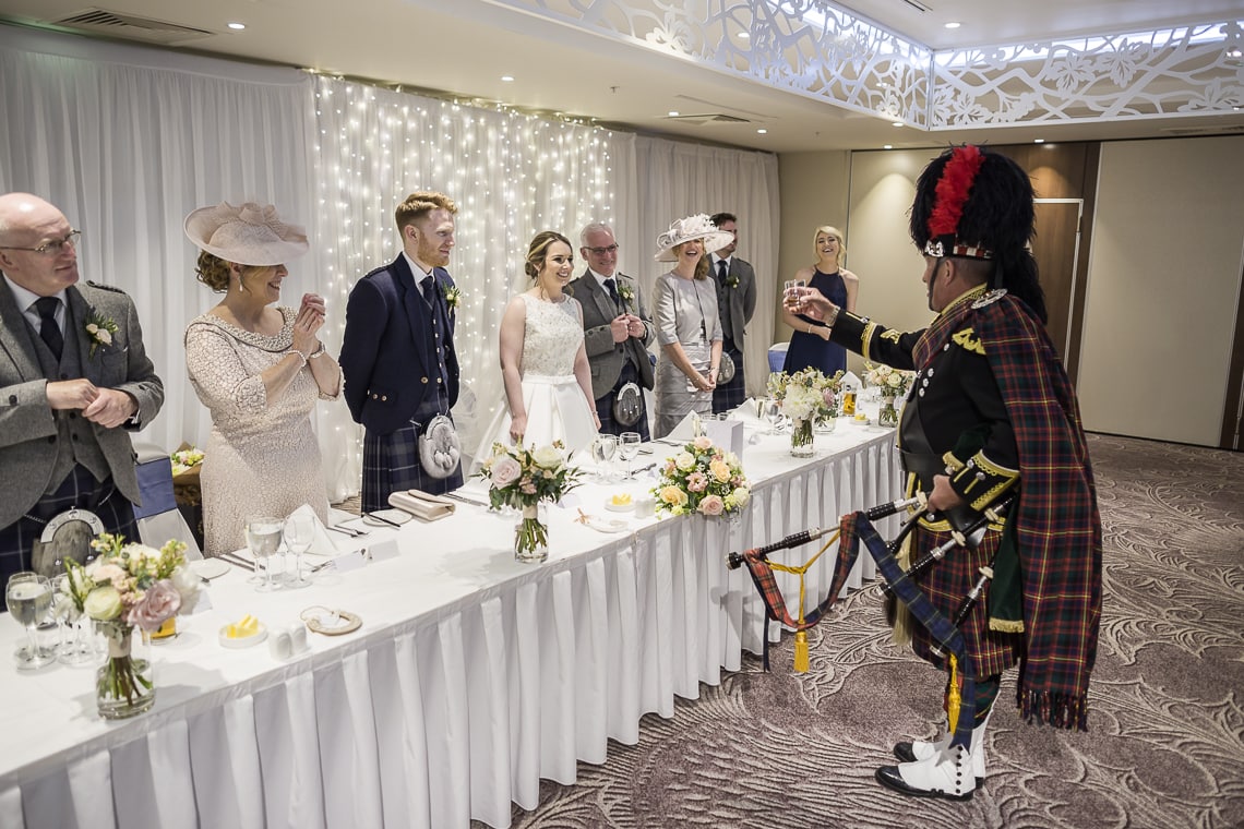 Piper toasts the newlyweds