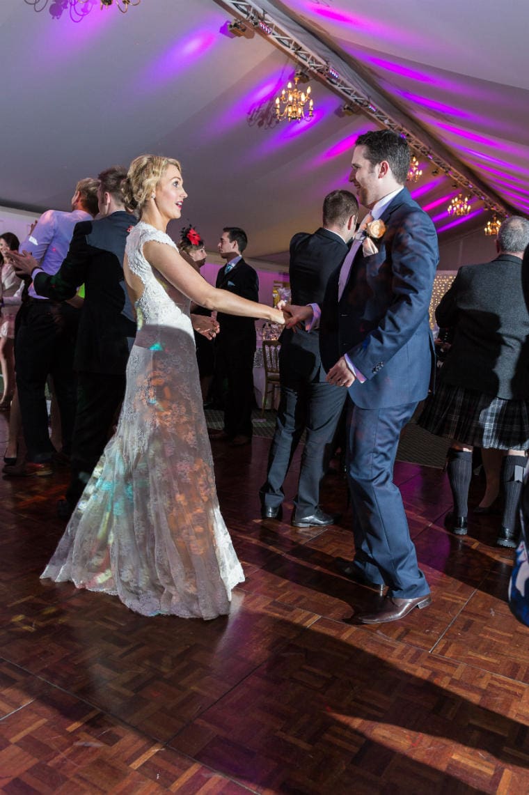 evening reception with newlyweds and guests dancing in the Pavilion