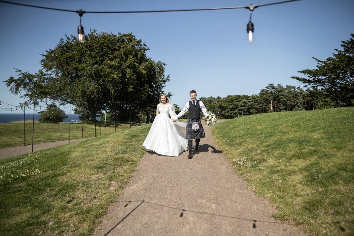 newlyweds make their way into the Pavilion