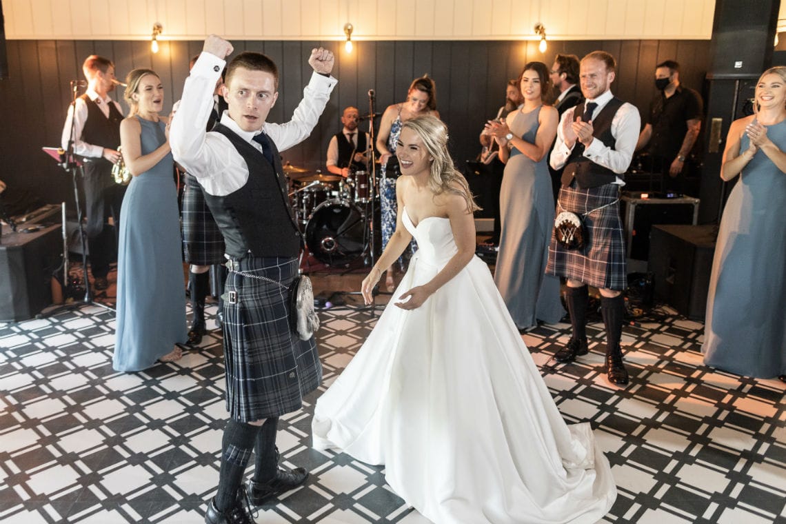 bride and groom dancing