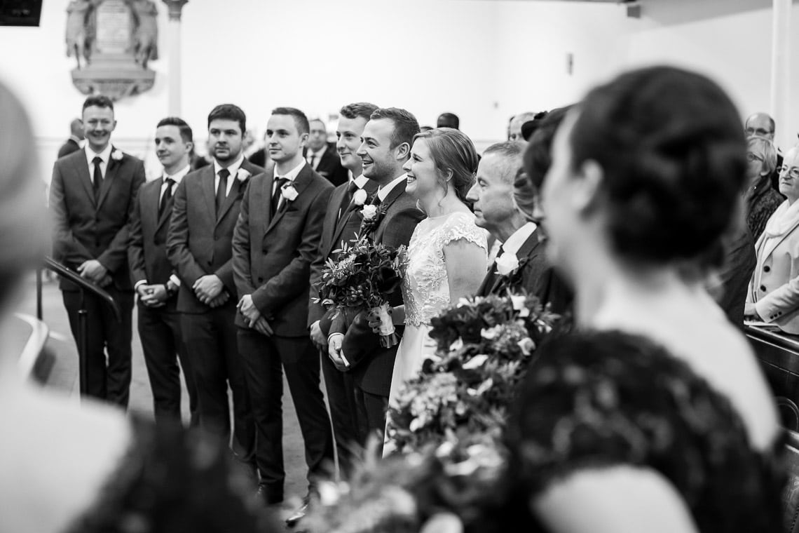 wedding party viewed from the front during ceremony at Liberton Kirk