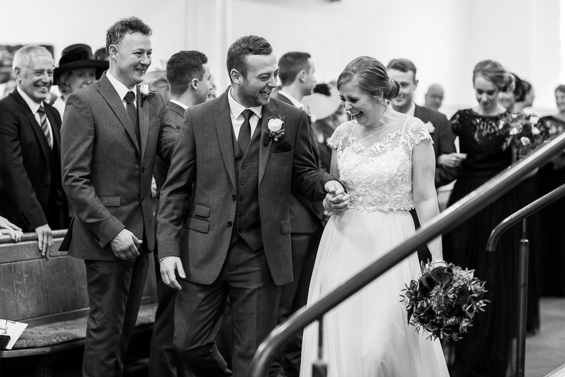 newlyweds depart during the recessional