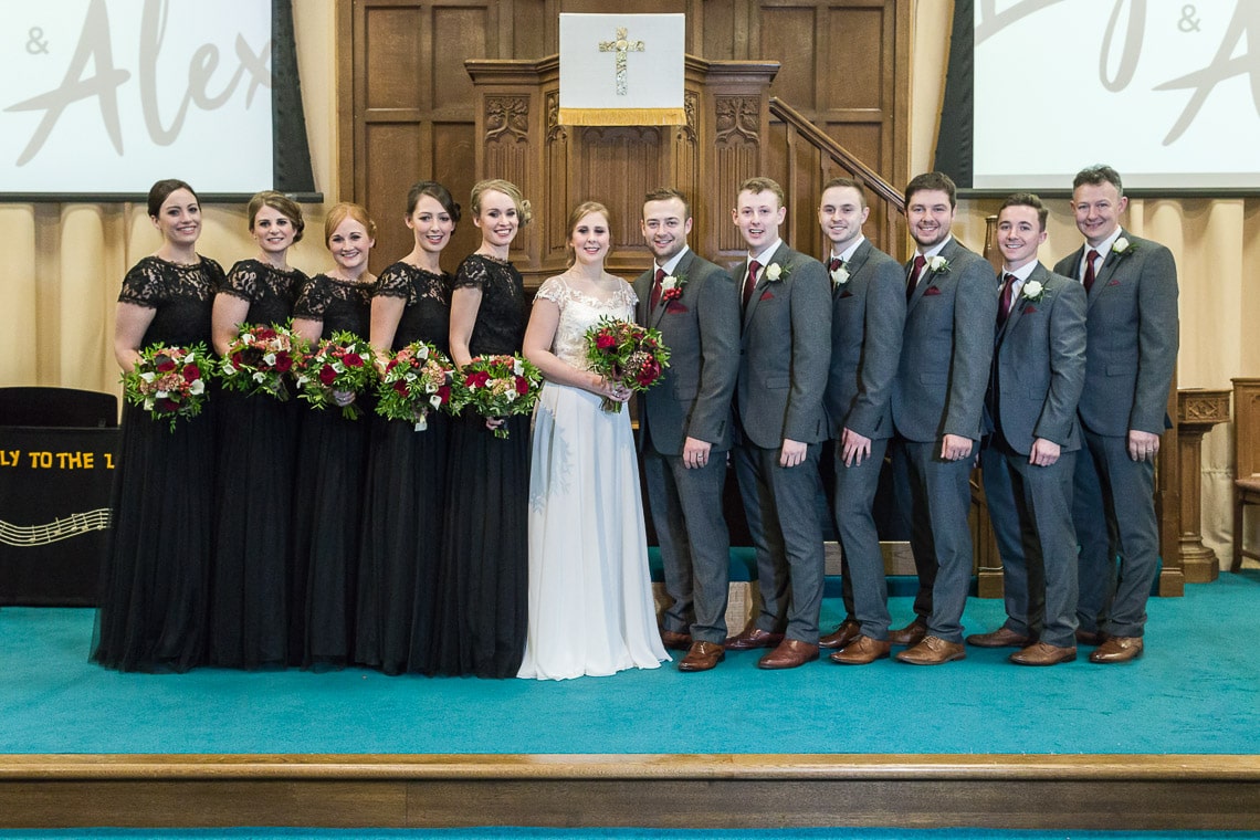 wedding party group photo on the altar at Liberton Kirk