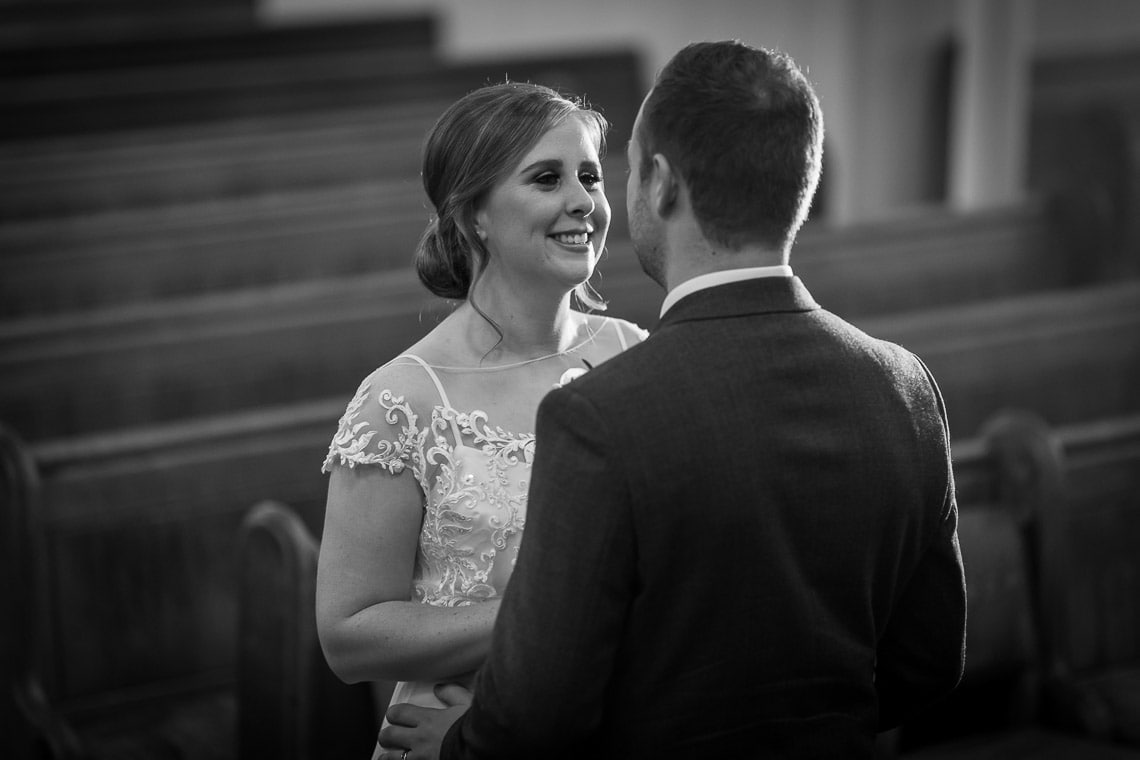 newlyweds looking at each other