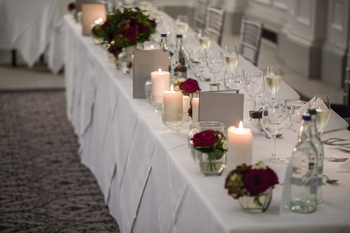 King's Hall top table with flowers and candles