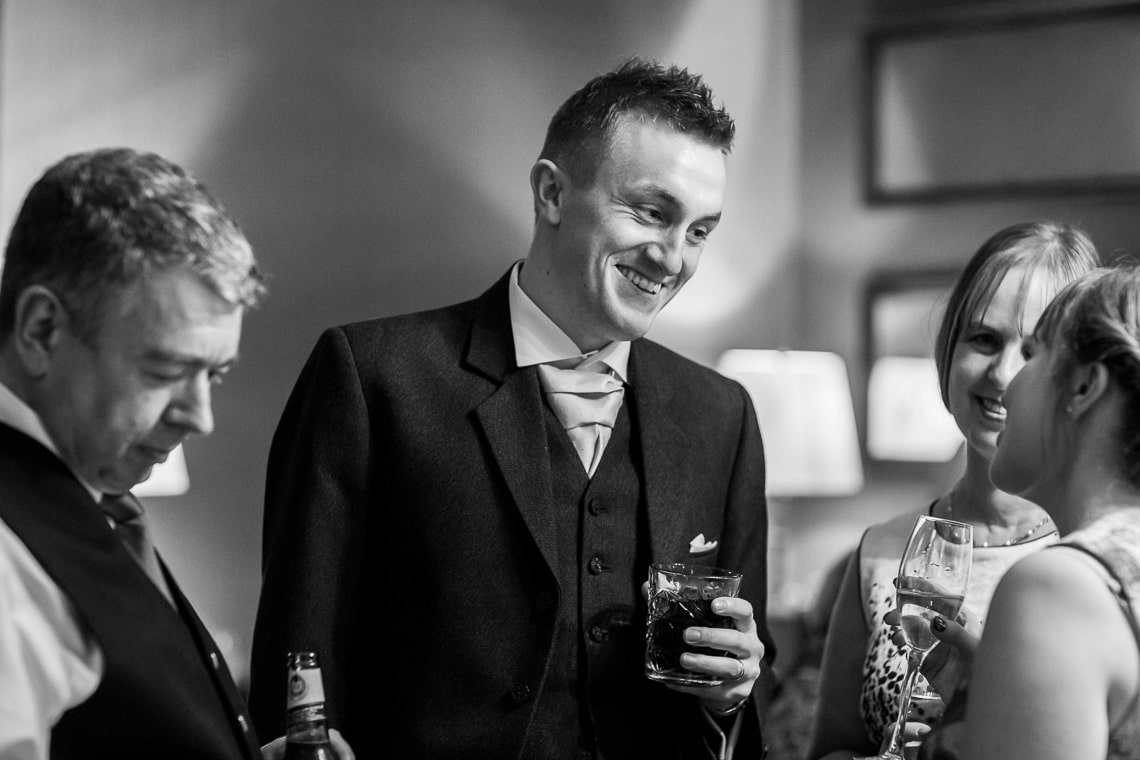 George Hotel Library champagne reception guest enjoying a drink