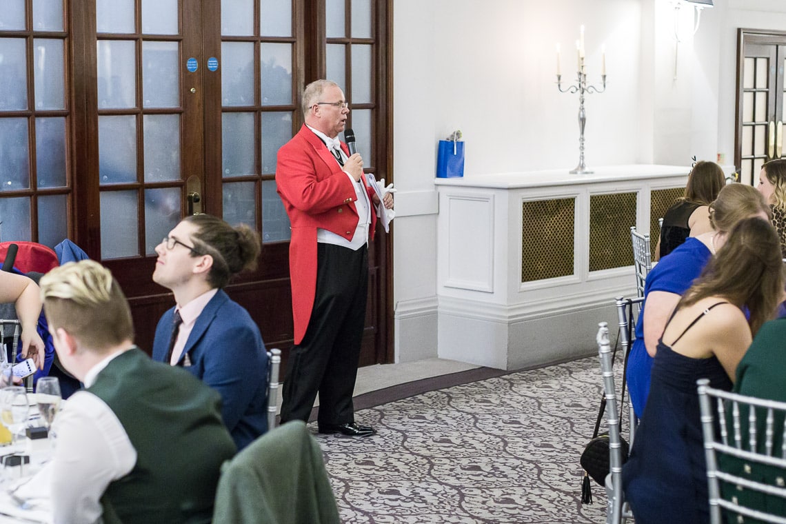 Toastmaster Maurice King announces the newlyweds to the King's Hall