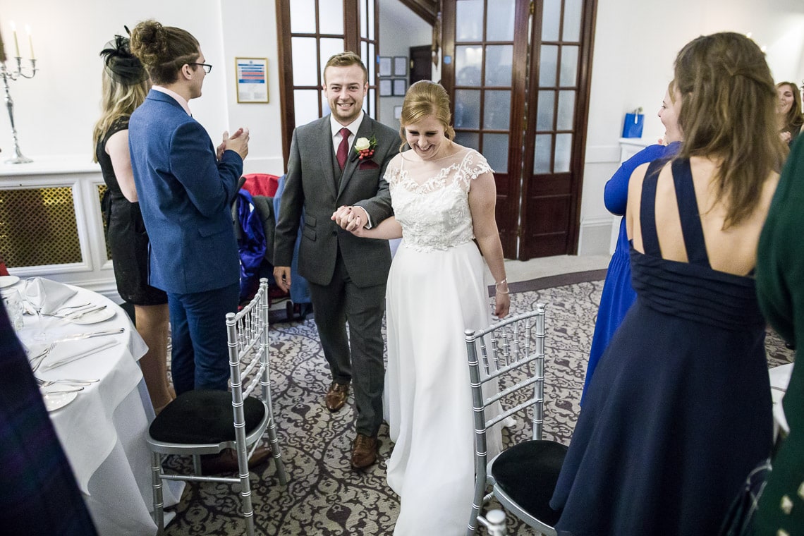 the newlyweds as they enter the King's Hall