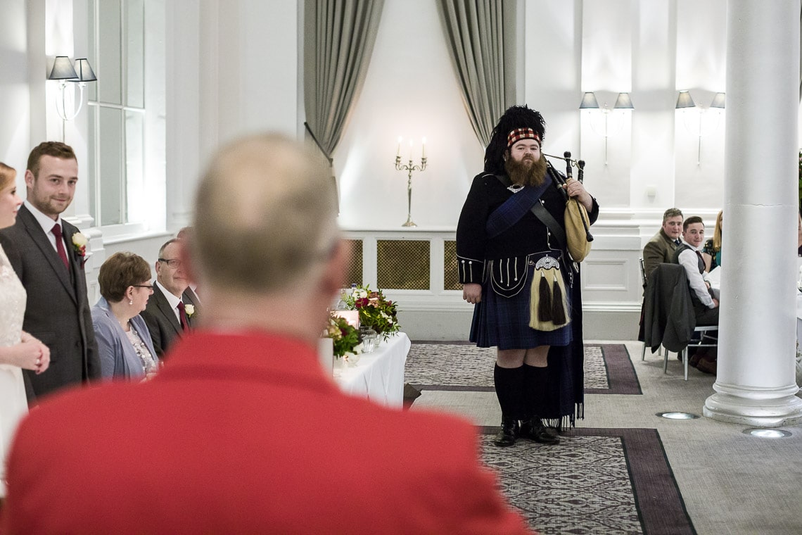 Piper toasts the newlyweds in the King's Hall