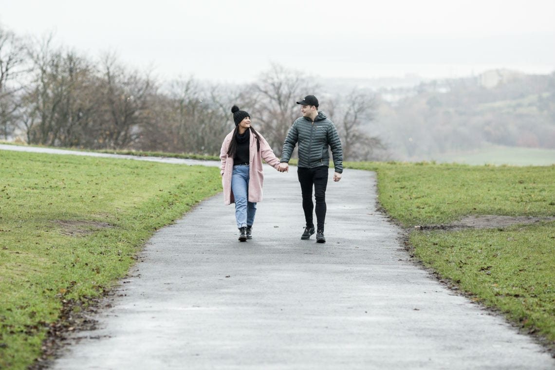 couple walking holding hands