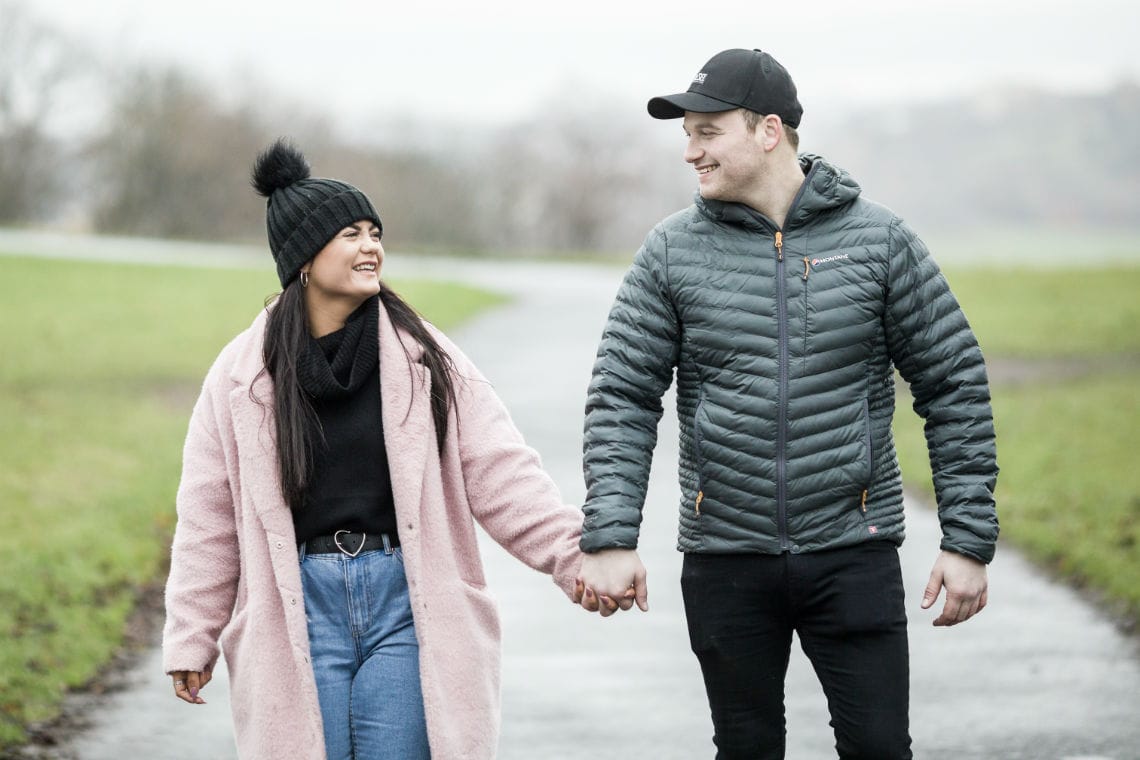 couple walking holding hands