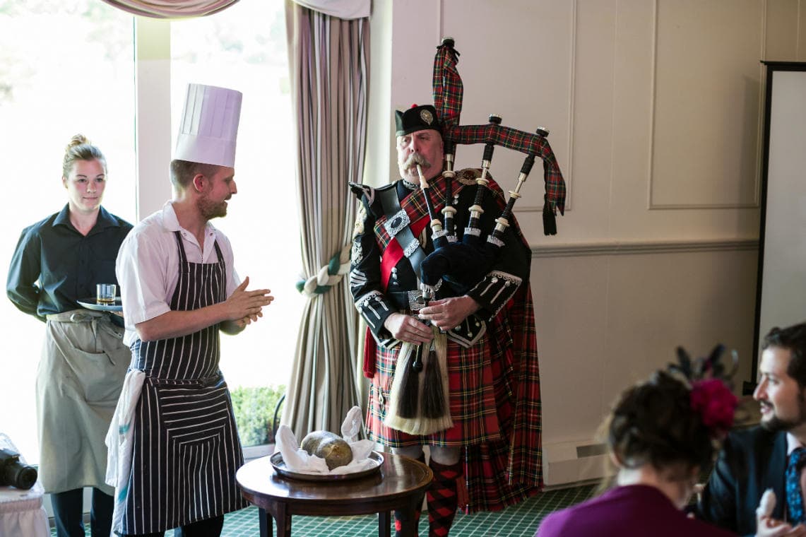 Pavilion piper welcomes the haggis