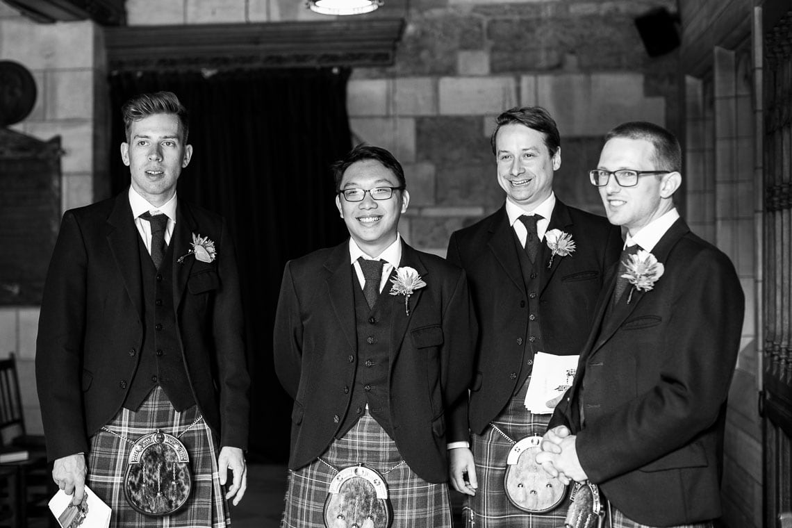 groomsmen waiting at the entrance
