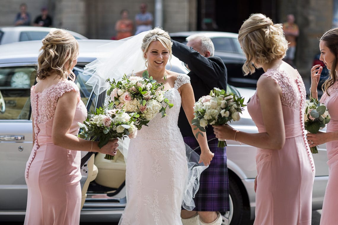 bride and bridesmaids arrive
