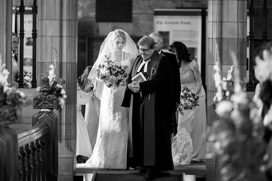 bridal party ready to walk up the aisle