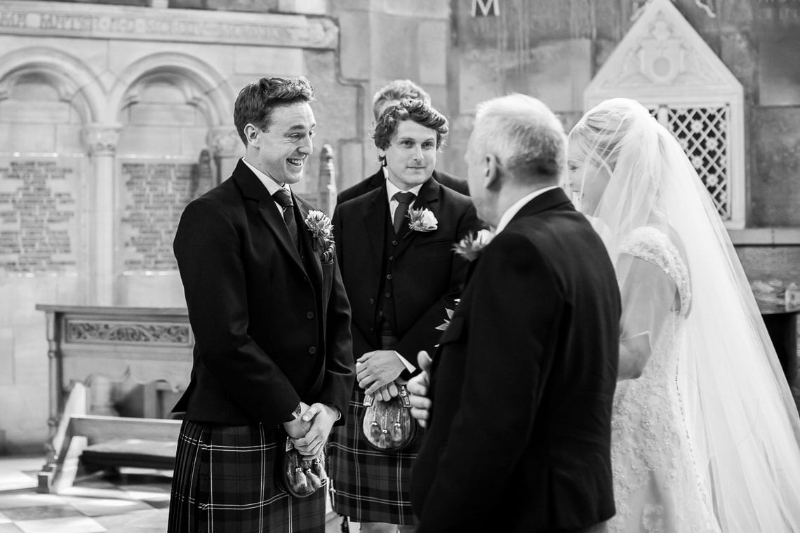groom welcomes his bride