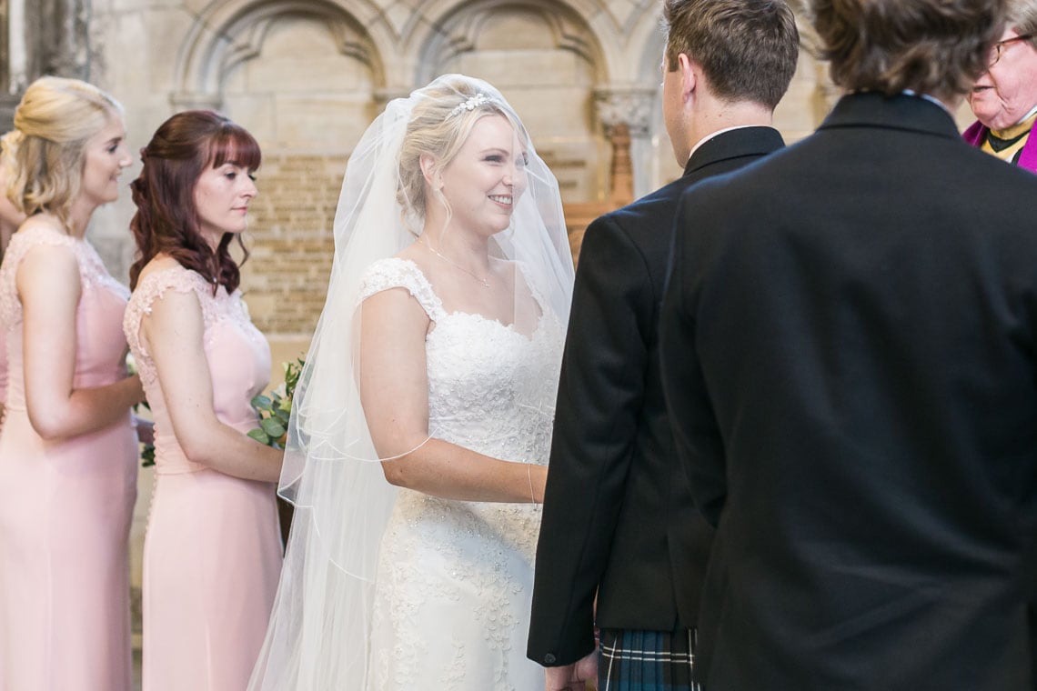 bride and groom exchange vows