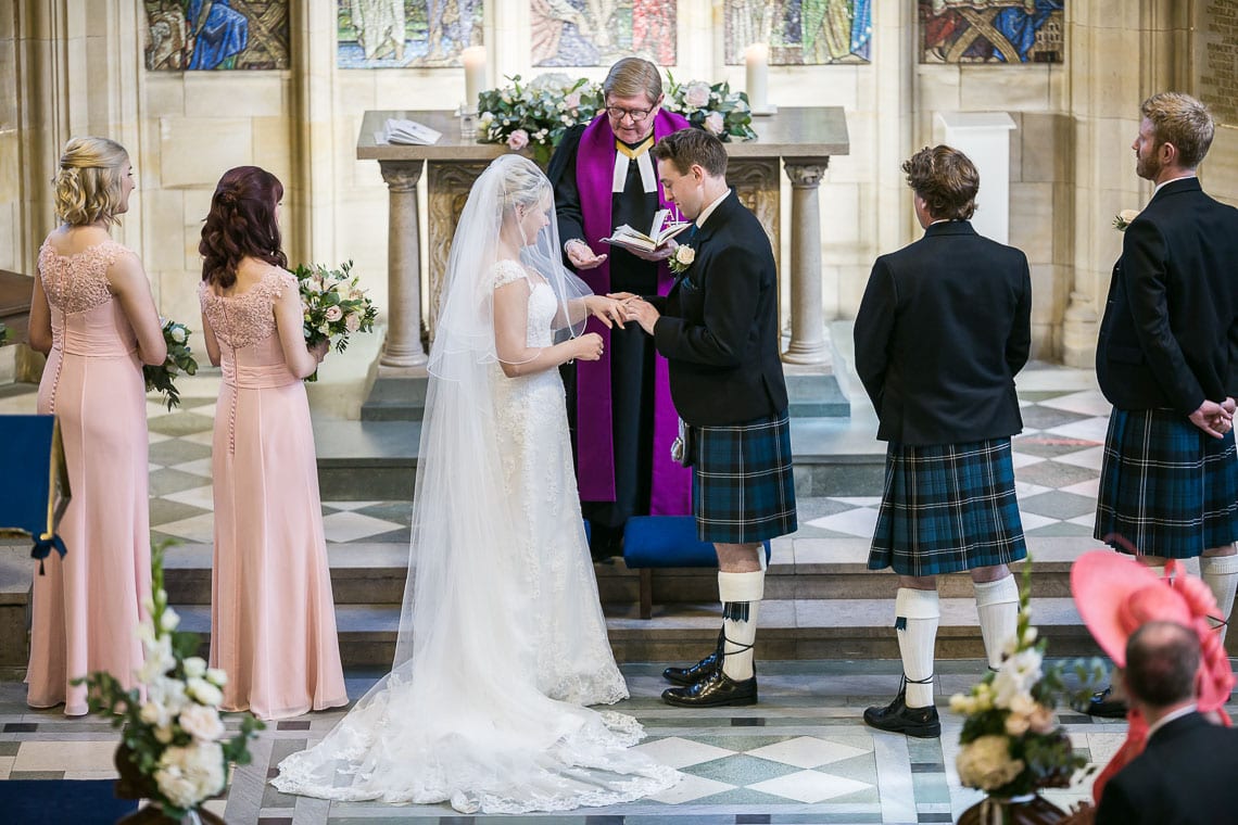 bride and groom exchange of rings